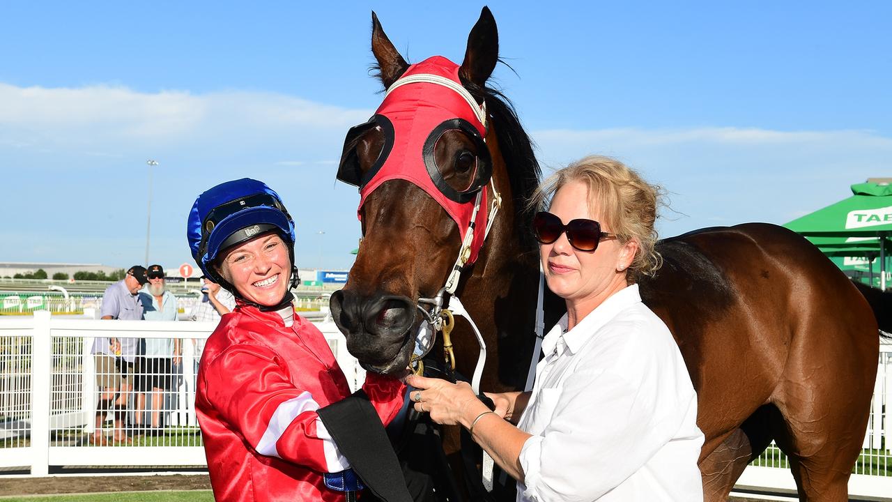 Leah Kilner, with her mother after riding Swanston to victory at Doomben, trained by her father Greg. Picture: Grant Peters/Trackside Photography.