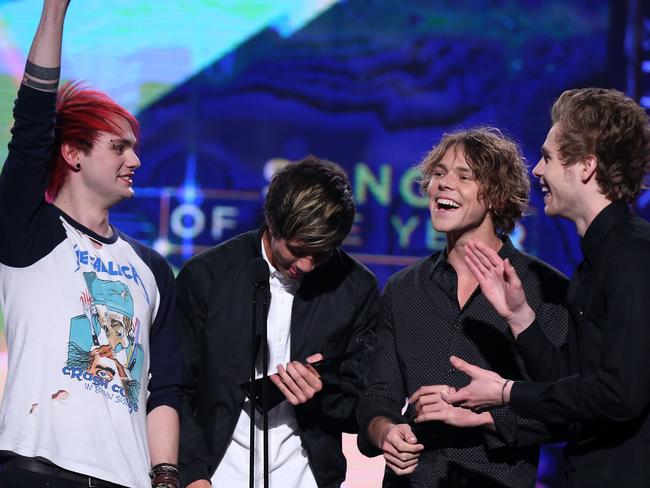 SYDNEY, AUSTRALIA - NOVEMBER 26: 5 Seconds of Summer receive and ARIA for Song of the Year during the 28th Annual ARIA Awards 2014 at the Star on November 26, 2014 in Sydney, Australia. (Photo by Brendon Thorne/Getty Images)