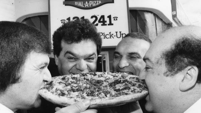 Gabriel, Bill, Louis and Evan Christou celebrate the opening of their 150th shop at Camden Park, July, 1994.