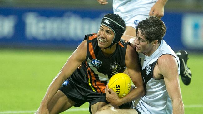 Yesteryear: Ben Rioli wins a contest against a Southport opponent at TIO Stadium. Picture: Glenn Campbell