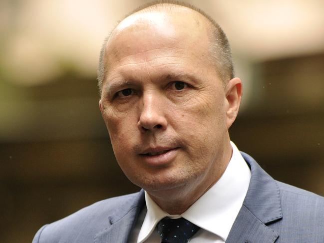 Australian Immigration Minister Peter Dutton arrives at the memorial service for Bill Leak, at Town Hall in Sydney, Friday, March 17, 2017. Leak was an editorial cartoonist and artist at The Australian newspaper, and passed away last week aged 61from a suspected heart attack. (AAP Image/Joel Carrett) NO ARCHIVING