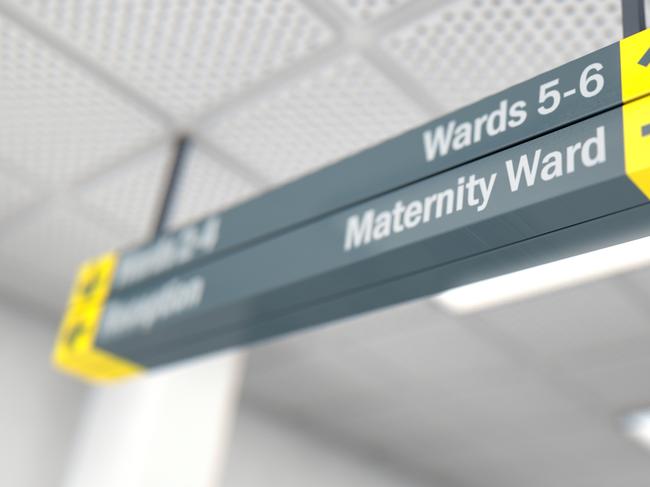 A ceiling mounted hospital directional sign highlighting the way towards the maternity, ward - 3D render