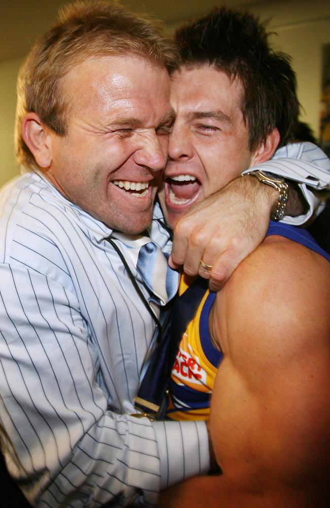 Chris Mainwaring and Ben Cousins after the Eagles won the flag.