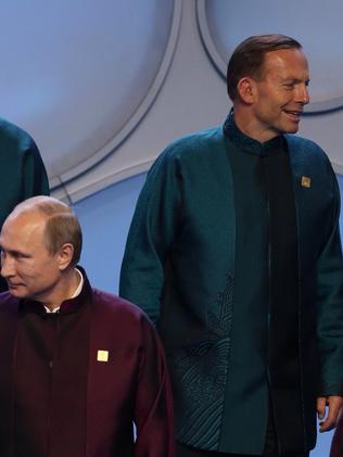 The awkward exchange between Abbott and Putin. Picture: Andrew Meares