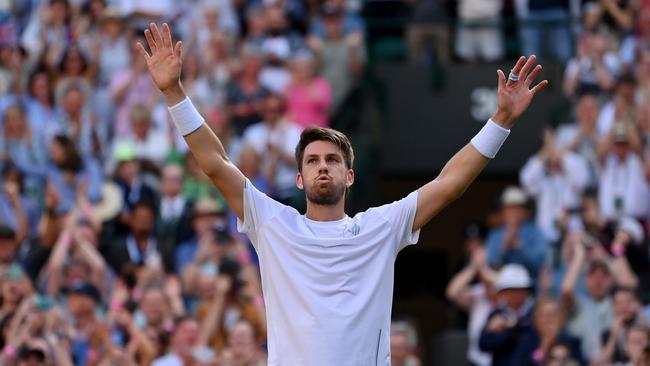 Cameron Norrie of Great Britain celebrates winning against David Goffin. Photo by Justin Setterfield/Getty Images.