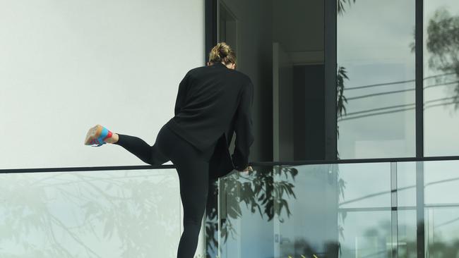 Kelsea jumps a fence.