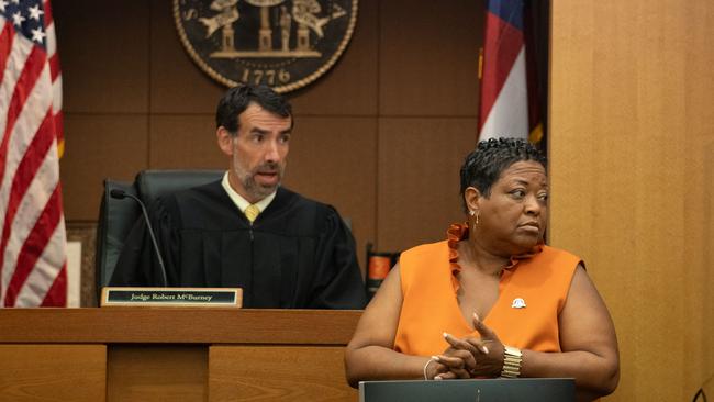 Fulton County Superior Court Judge Robert McBurney receives the indictment against Donald Trump. Picture: Getty Images via AFP.