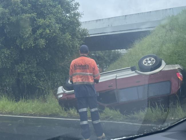 Truck, car roll in spate of separate wet weather emergencies