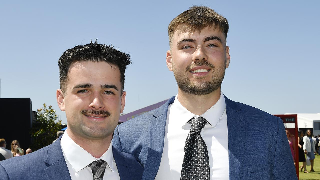 Caulfield Guineas horse race meeting, Caulfield, Victoria, Saturday 12th October 2024. Faces in the crowd. Pictured enjoying the race meeting are Jonathan and Jackson. Picture: Andrew Batsch