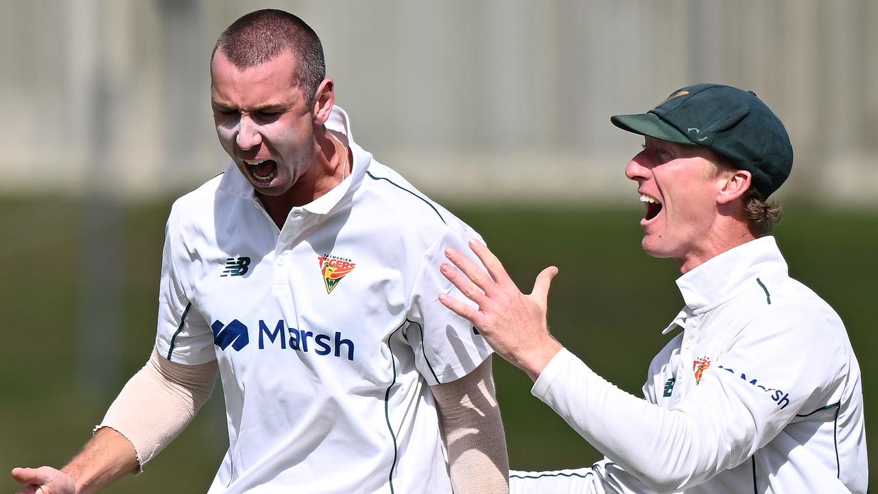 Long-time Victorian grade cricketer Kieran Elliott was jubilant after claiming the wicket of Cameron Green on debut for Tasmania in Hobart on Friday. Picture: Steve Bell / Getty Images