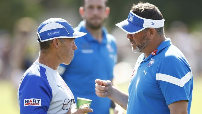 Kangaroos head coach Alastair Clarkson (L) chats with Kangaroos assistant coach Brett Ratten. Picture: Getty Images