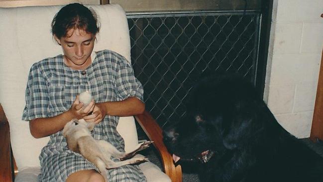 Rachel Antonio feeds a baby wallaby in 1997, the year before her disappearance.