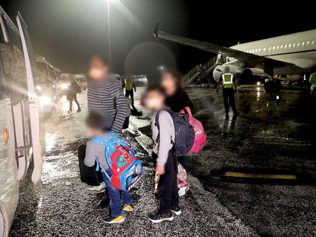 The first evacuees to Christmas Island wore face masks and included men, women and children. Picture: Supplied