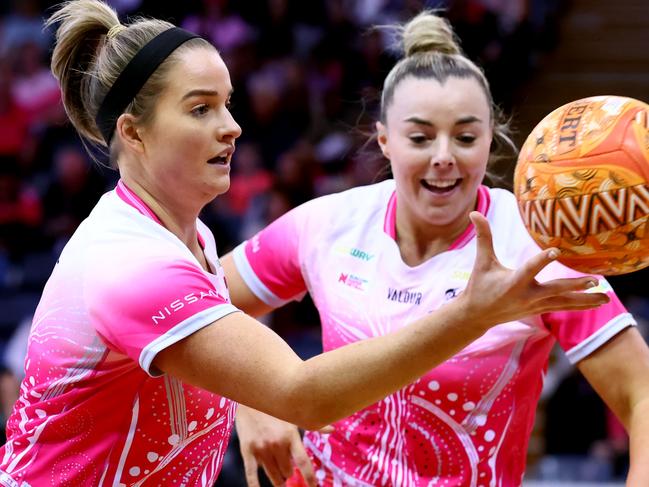 ADELAIDE, AUSTRALIA - MAY 30: Maisie Nankivell and Elle McDonald of the Thunderbirds during the round five Super Netball match between Adelaide Thunderbirds and Sunshine Coast Lightning at Priceline Stadium, on May 30, 2021, in Adelaide, Australia. (Photo by Kelly Barnes/Getty Images)