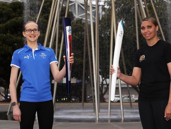 SYDNEY, AUSTRALIA - SEPTEMBER 15: Tamsin Colley and Tenayah Logan pose after the relighting of the Olympic cauldron during a ceremony to celebrate the 20th Anniversary of the Sydney 2000 Olympic Games, at Sydney Olympic Park on September 15, 2020 in Sydney, Australia. (Photo by Mark Kolbe/Getty Images)