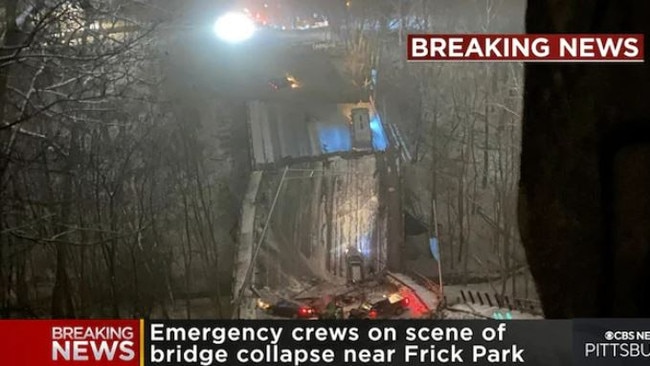 Vehicles including a Port Authority bus are left stranded after a bridge collapsed in Pittsburgh, Pennsylvania. Picture: AFP.