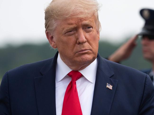 US President Donald Trump speaks to the press on arrival at Morristown Municipal Airport in Morristown, New Jersey, on August 14, 2020. (Photo by JIM WATSON / AFP)