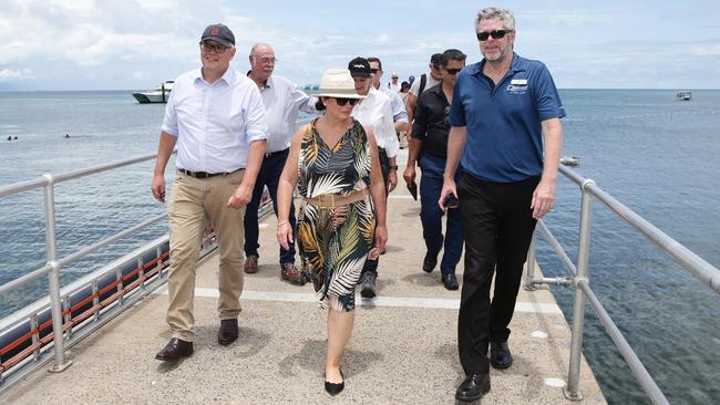 Prime Minister Scott Morrison, his wife Jenny Morrison and Quicksilver CEO Tony Baker arrive at Green Island in late January. Picture: Brendan Radke