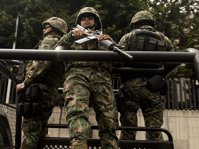 Mexican Navy marines on patrol following the arrest of drug lord Miguel Trevino in 2013.