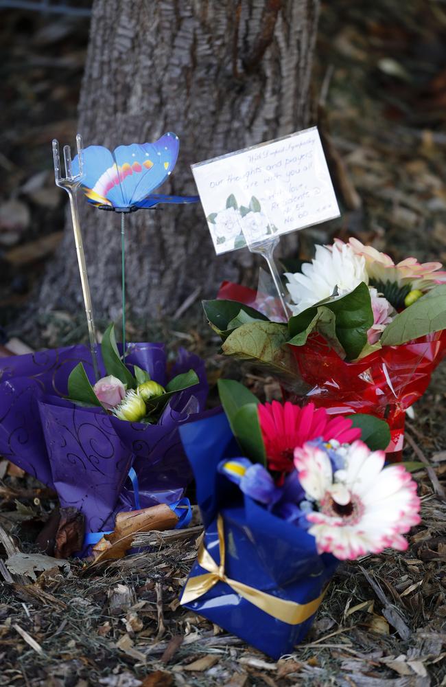 Flowers and cards left by friends and relatives. Picture: Sam Ruttyn