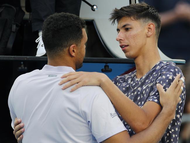 Popyrin consoles his idol Jo-Wilfried Tsonga. Picture: AP/Andy Wong