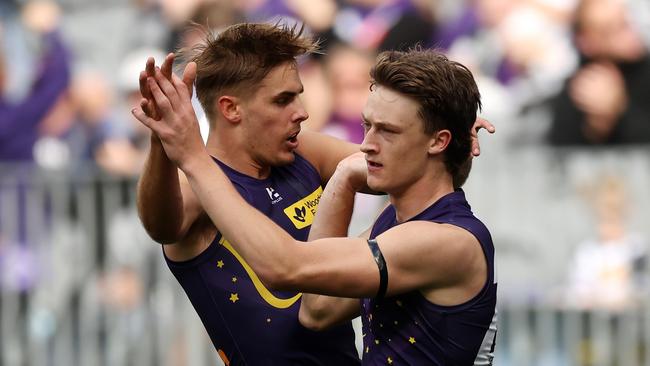 PERTH, AUSTRALIA - JULY 21: Jye Amiss of the Dockers celebrates a goal with teammates during the 2024 AFL Round 19 match between the Fremantle Dockers and the Melbourne Demons at Optus Stadium on July 21, 2024 in Perth, Australia. (Photo by Will Russell/AFL Photos via Getty Images)