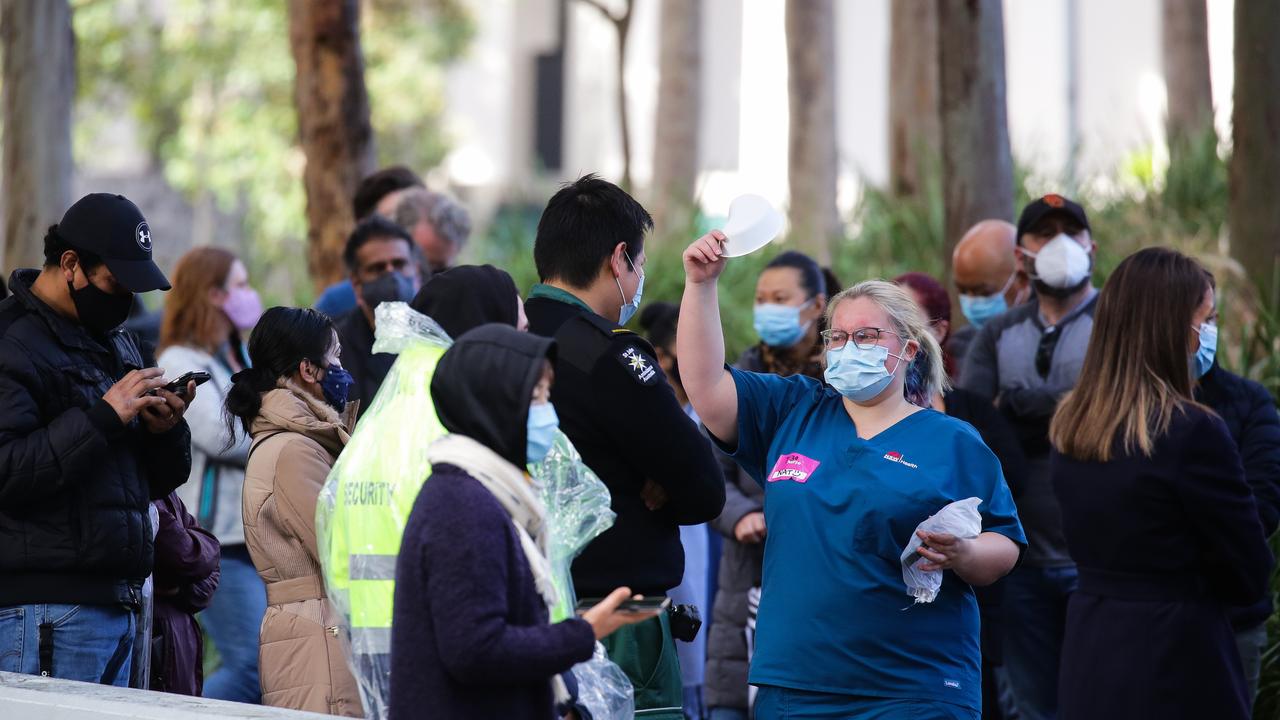 Queues of people lining up to get the Covid-19 vaccine at the Olympic Park Vaccination Hub in Sydney on Wednesday. Picture: NCA NewsWire/Gaye Gerard