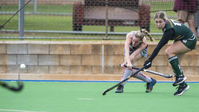 Megan Groves (left) of Gladstone and Gabby Nicholls of Ipswich in Hockey Queensland Championships at Clyde Park, Sunday, May 2, 2021. Picture: Kevin Farmer