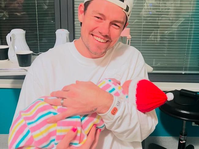 Lachie Neale with baby Freddie