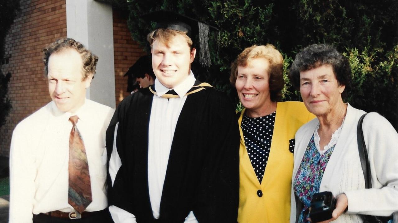 Jeffrey Brooks with his parents and  grandma at his graduation.