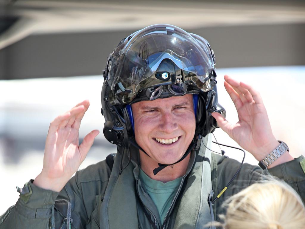 Australian Pilots training in the F35 fighter Jets Luke Airforce Base in Phoenix Arizona. Squadron leader call sign “Belly” talks to RAAF Corp Lorna Hill who is part of the maintenance and ground crew team before a flight. Picture: Nathan Edwards