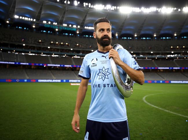 PERTH, AUSTRALIA - MAY 19: Alex Brosque of Sydney FC poses with the A-League trophy after playing his final A-League match, winning the 2019 A-League Grand Final match between the Perth Glory and Sydney FC at Optus Stadium on May 19, 2019 in Perth, Australia. (Photo by Cameron Spencer/Getty Images)