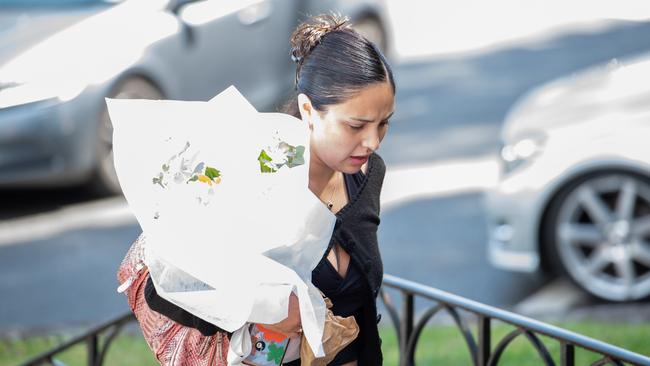 A mourner at the funeral. Picture: Thomas Lisson