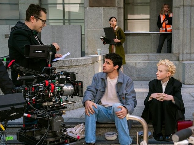 Director Leigh Whannell, Christopher Abbott and Julia Garner on the set of Wolf Man.