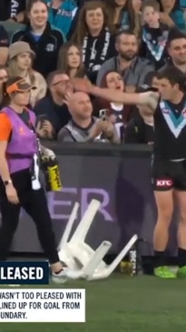 AFL star slammed over water-girl act