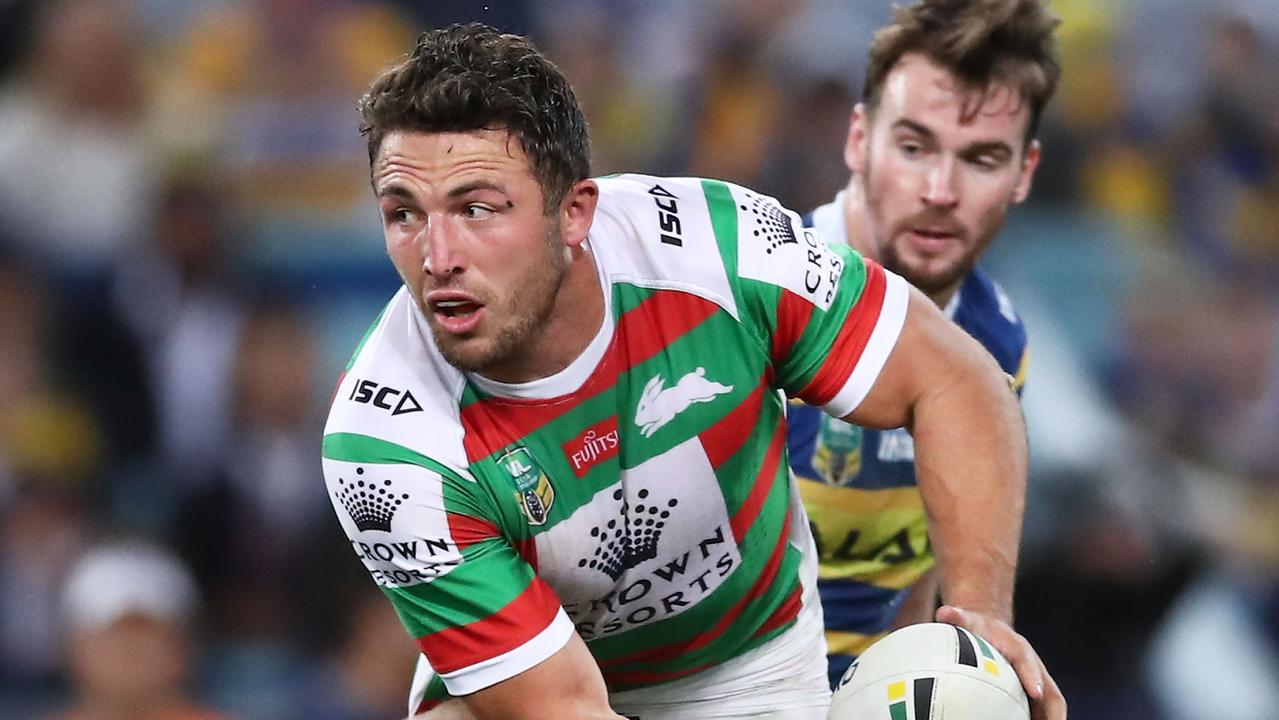Sam Burgess is chased by Clint Gutherson.