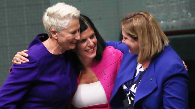 Dr Kerryn Phelps with Julia Banks and Rebekha Sharkie after the vote passed the House overnight. The controversial Medevac Bill gives doctors more say to transfer refugees to Australia. Picture: Gary Ramage