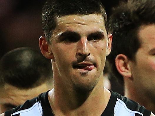 AFL - Sydney Swans v Collingwood Magpies at the Sydney Cricket Ground. Scott Pendlebury leads the team off the field after their 11 point loss to the Swans. Picture: Toby Zerna