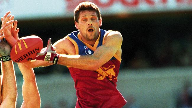 Darryl White, in his Brisbane Lions heyday, wants the league to provide funding for the AFL indigenous radio service,