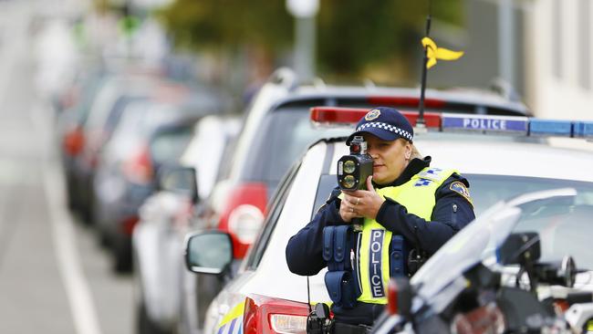 Tasmania Police conduct a blitz around schools. Pictured in Campbell Street, Hobart are Constables Alison Woolley and Simon Schuringa ensuring speed limits are observed 2018. Picture: MATT THOMPSON