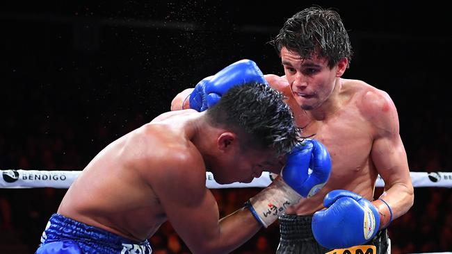 Brock Jarvis lands a punch to Ernesto Sailing during their super bantamweight bout in Bendigo at the weekend. Picture: Getty Images