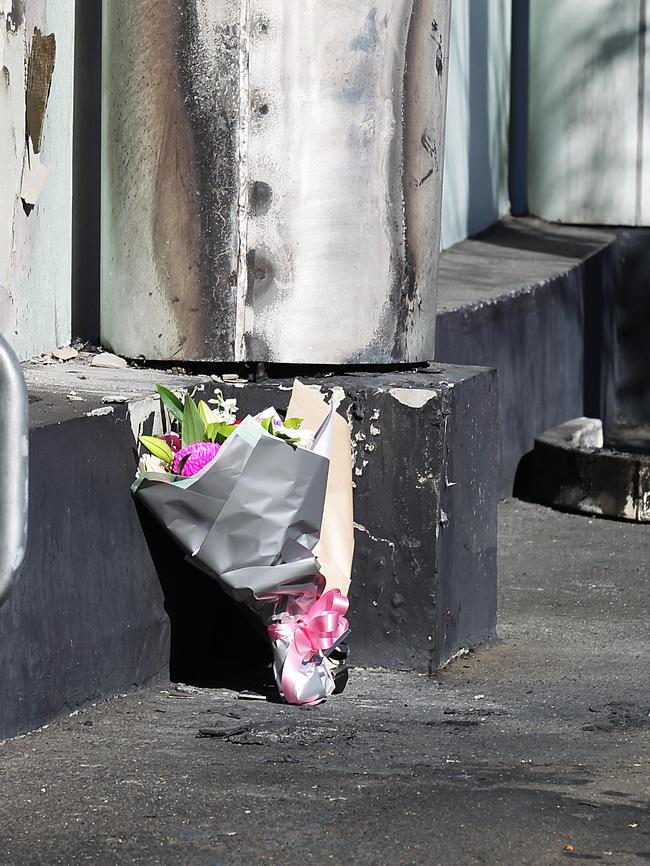 Flowers laid at the Darling Harbour scene today. Picture: Danny Aarons