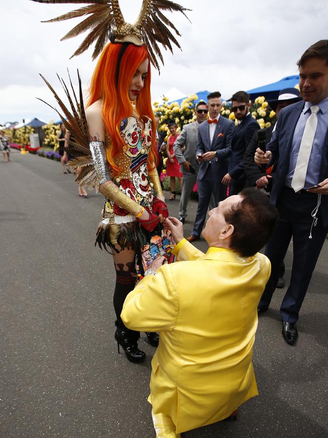 Geoffrey Edelsten proposing to Gabi Grecko in the Birdcage. Picture: Bradley Hunter