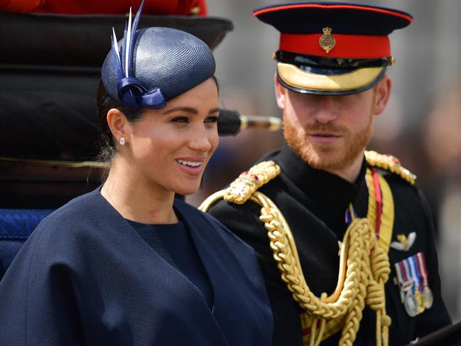 Meghan and Harry having a royal protocol debriefing after Trooping The Colour. Picture: AFP