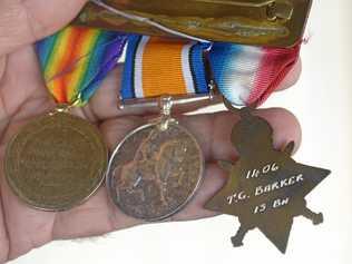 Graham Guth at Rockhampton Military Museum with the medals which were lost on East Street. Picture: Jann Houley