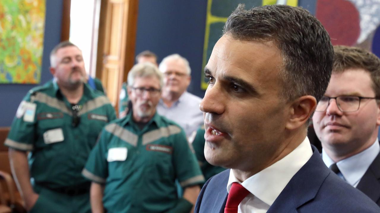 Labor Leader Peter Malinauskas with ambulance officers and health workers at Parliament House. Picture: Dean Martin