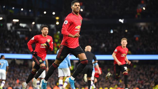 Marcus Rashford celebrates scoring Manchester United’s first goal against Manchester City at Etihad Stadium. Picture: Getty Images