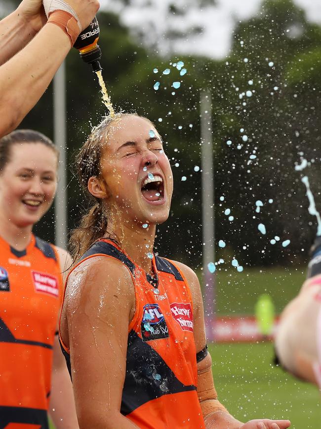 Georgia Garnett is drenched after GWS’ victory.