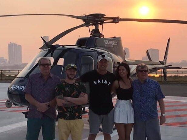 Sea World Helicopters Chief Pilot Ash Jenkinson (centre), who died in a chopper collision over the Gold Coast Broadwater on Monday.