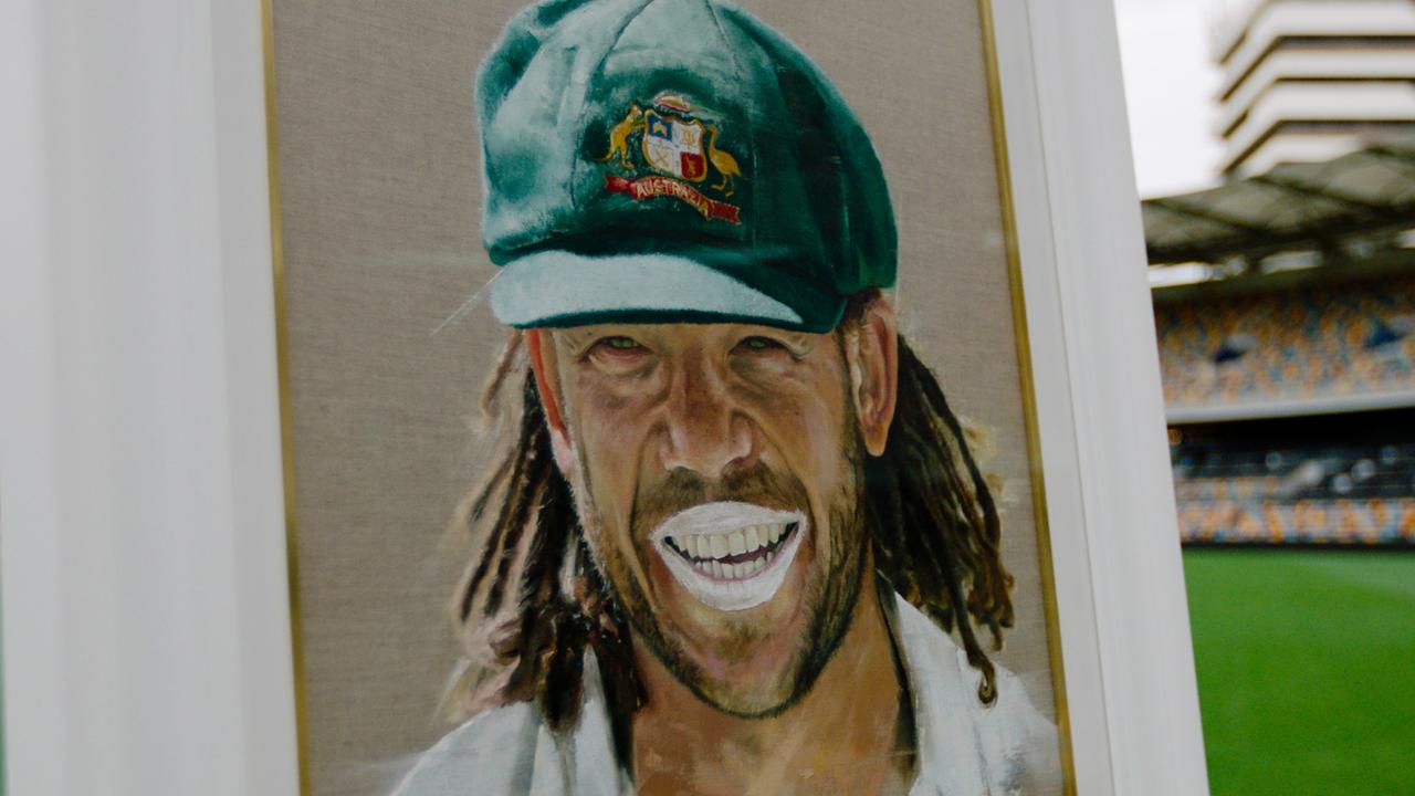 Andrew Symonds painting at The Gabba.